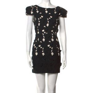 Tibi black white floral applicate open back mini dress.